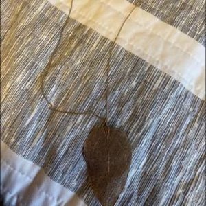 Aldo leaf pendant necklace.